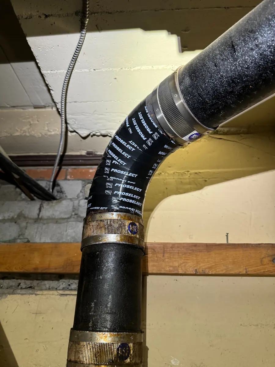 Old drain line tied into new ABS pipe